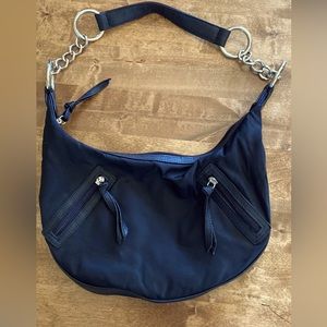 Black nylon and faux leather handbag